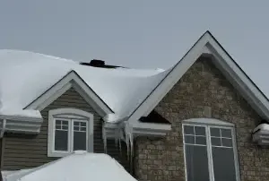 When to Clear Snow Off My Roof